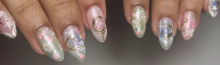 Beautiful gel on natural nails with pastel shades and glossy finish at Riri Nails salon in Muscat, Oman.